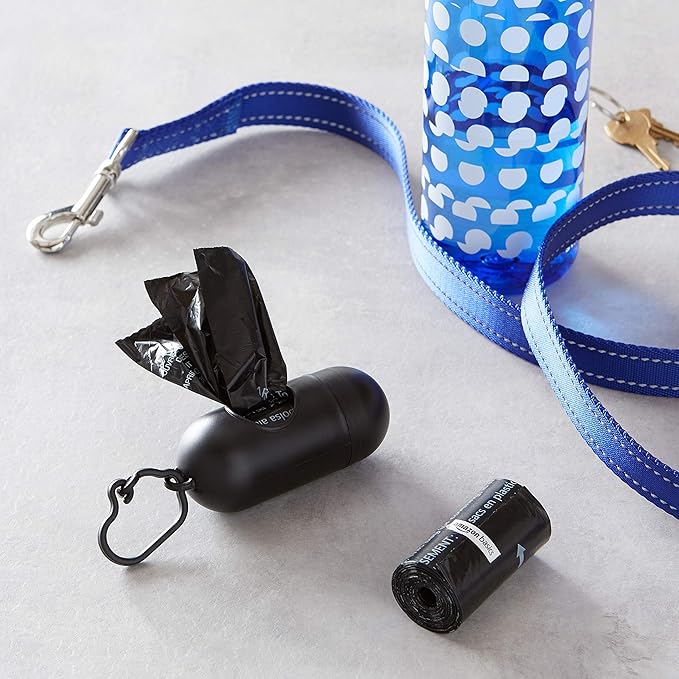 Amazon Basics Dog Poop Bags with Dispenser, 900 Count, Enhanced for Guaranteed Leakproof, Unscented, Includes Leash Clip